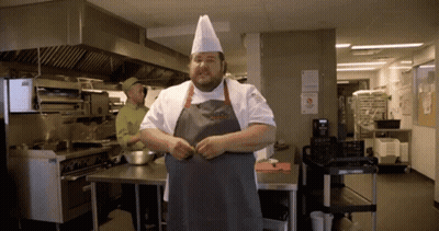 Chef In Kitchen With No Smoking Sign GIF
