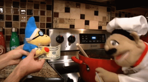 Chef Puppet Holding Dollar Bill In Front Of Samsung Appliance GIF