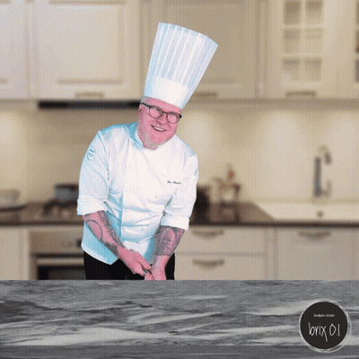 Chef Standing At Kitchen Counter GIF