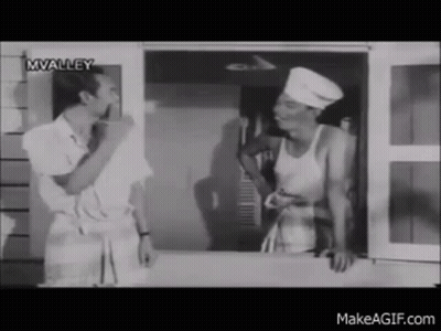 Chef Talking To Man In Black And White Kitchen GIF