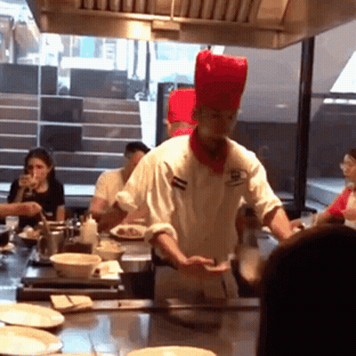 Chef With Red Hat Cooking GIF