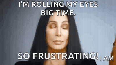 Cher Is Making A Funny Face With Her Eyes Closed . GIF