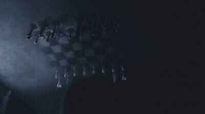 Chess Board With Pieces In Dark GIF