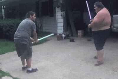 Chewbacca Close Up With Woman In Background GIF