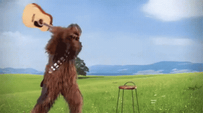 Chewbacca Holding Guitar In Field GIF