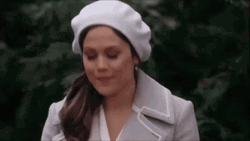 Chic Lady Looking Thru Binoculars GIF