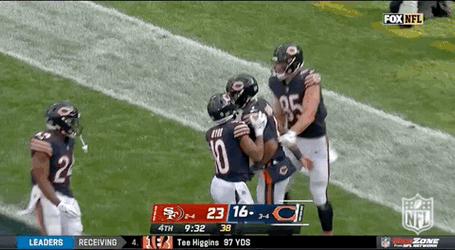Chicago Bear Players Patting Down Jersey Number 1 GIF