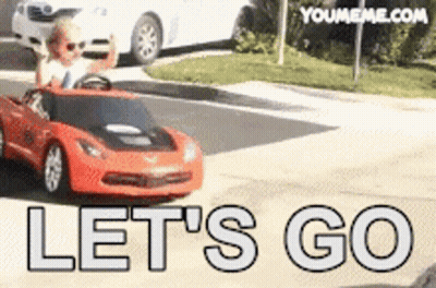 Child Driving Red Car Lets Go