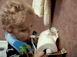 Child Eat The Toilet Paper GIF