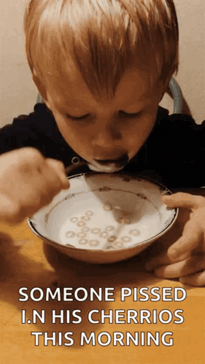 Child Eating Cheerios Pissed In His Cheerios GIF