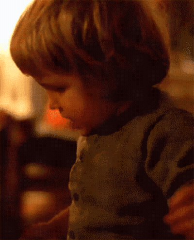 Child Face Behind Just Win Sign GIF