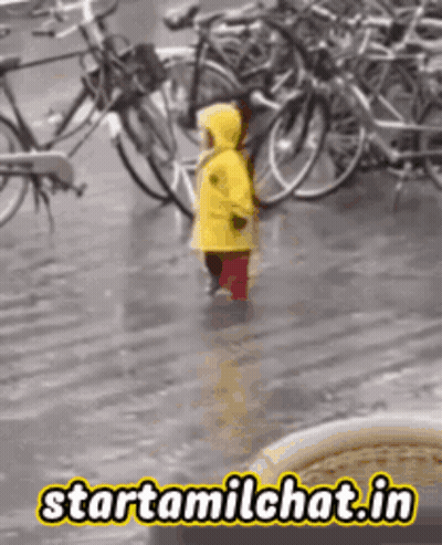 Child In Yellow Raincoat Walking In Rain Starttamilchat GIF