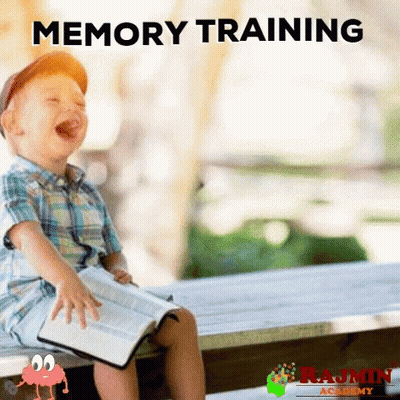 Child Laughing On Bench With Book GIF