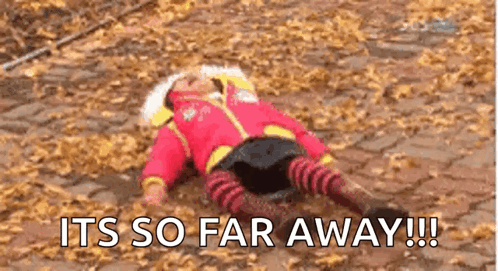 Child Lying On Leaves Saying It's So Far Away GIF
