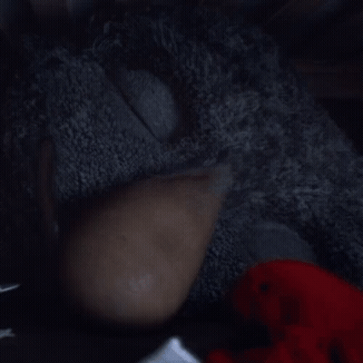 Child Peeking From Under Table With Surprise GIF