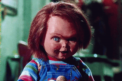 Child's Doll With Red Hair GIF