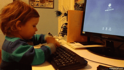 Child Typing On Keyboard Monitor Saying Hetro GIF