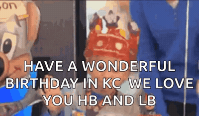 Child Wearing Crown in Front of Chuck E Cheese Mascot