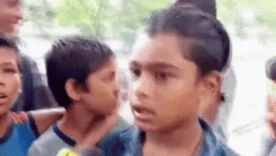 Children Crowd One Holding Another's Neck GIF