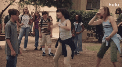 Children Dancing In Front Of Hulu Building GIF