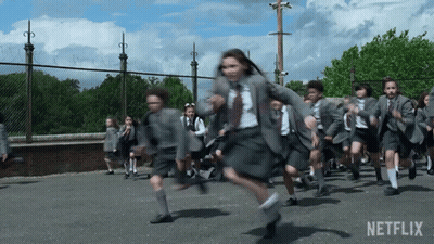 Children In School Uniforms Running GIF