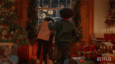 Children Looking Out Window at Christmas Tree