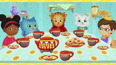 Children Sitting Around Table With Tea Cups And Cookies GIF