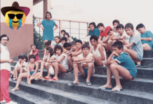 Children Sitting On Stairs With Smiley Face GIF