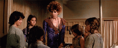 Children Standing Around Woman In Purple Dress GIF