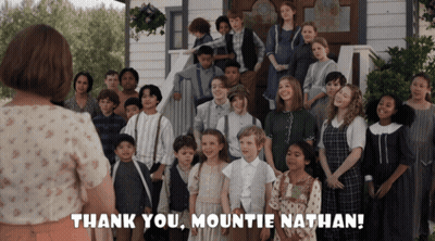 Children Standing In Front Of Thank You Mountie Nathan GIF