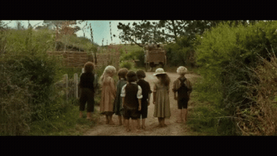 Children Standing On Dirt Path GIF