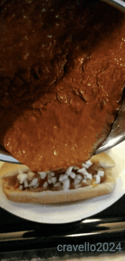 Chili Dog Being Poured On Plate 2024 GIF