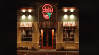 Chili's Restaurant With Red Door And Awnings GIF