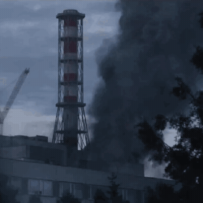 Chimney With Red White and Blue Smoke