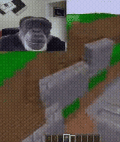 Chimpanzee Playing Video Game On Table GIF