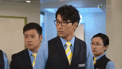 Chinese Hotel Staff Eyebrows Up  GIF