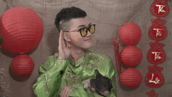 Chinese Le Thien Hieu Holding His Pet Pig GIF