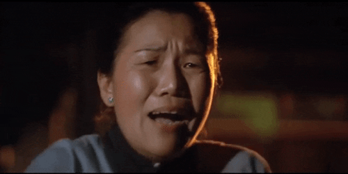 Chinese Woman Shaking In Fear GIF
