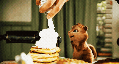 Chipmunk Looking At Pancakes With Whipped Cream GIF