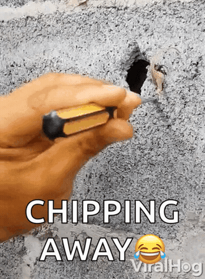 Chipping Hole In Concrete Wall GIF
