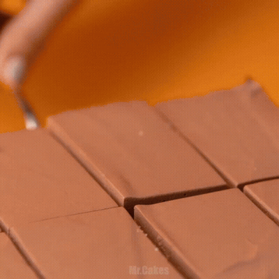 Chocolate Cake On Wooden Board With Mr.cakes GIF