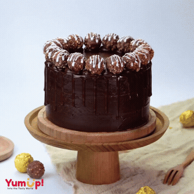 Chocolate Cake On Wooden Stand GIF