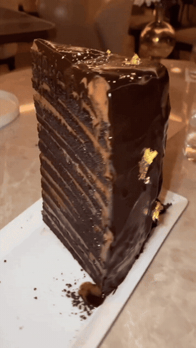 Chocolate Cake Slice With Gold Leaf GIF