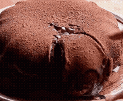 Chocolate Cake With A Bite Taken Out GIF
