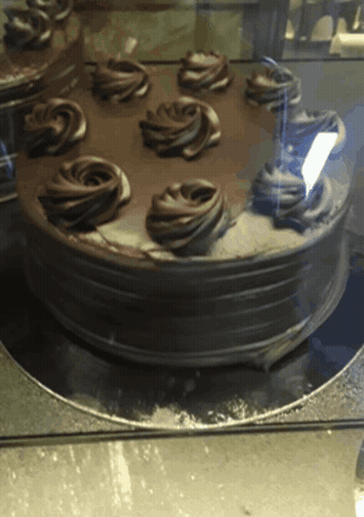 Chocolate Cake With Swirls Of Frosting GIF