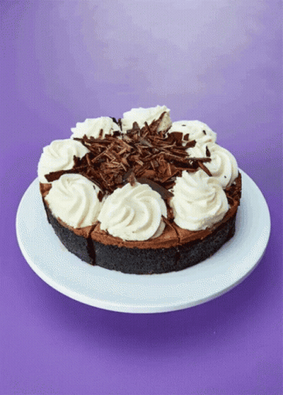 Chocolate Cake With Whipped Cream And Chocolate Shavings GIF