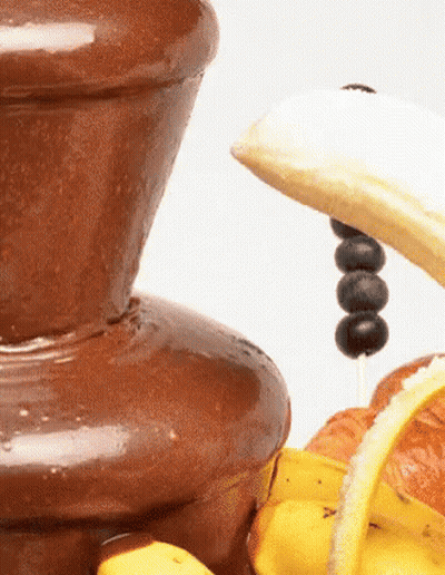 Chocolate Fountain With Dipping Banana GIF
