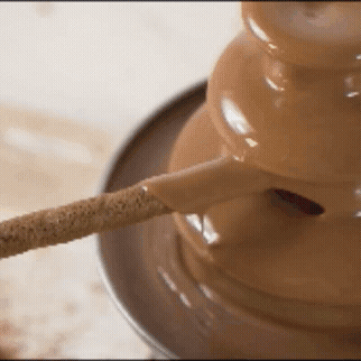 Chocolate Fountain With Stick GIF