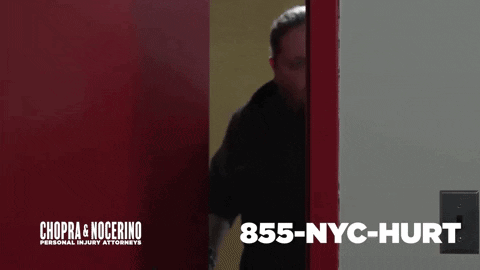 Chopra & Nocerino Personal Injury Attorneys Man Peeking Out Of Door GIF