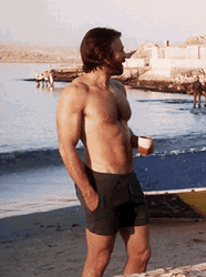 Chris Evans Coffee In Beach GIF